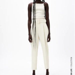 PANTS WITH FABRIC-COVERED BELT